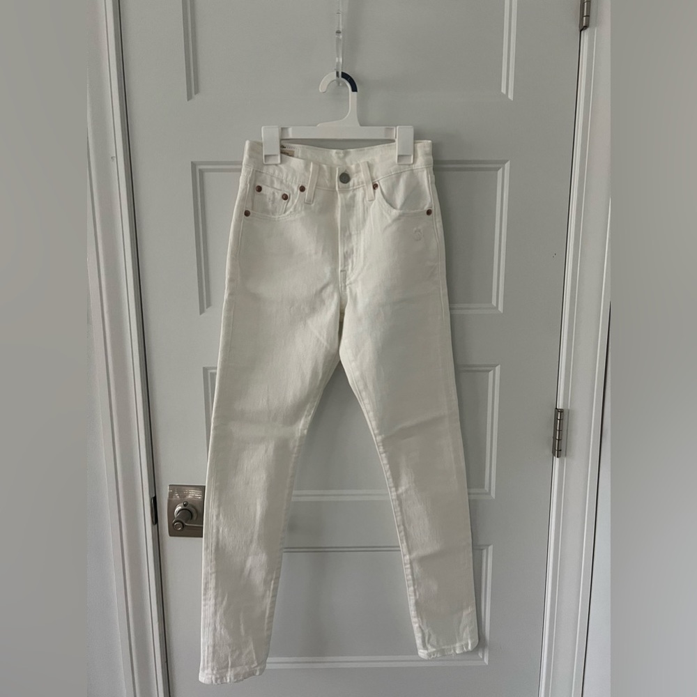 Levi’s white skinny jeans, European size 25.